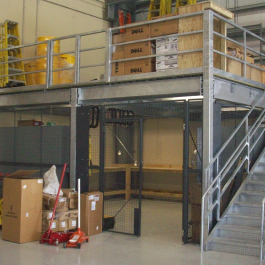 Steel Mezzanine with Security Cage Below