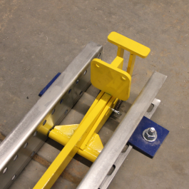 Pallet Hold Back Device For Flow Lanes