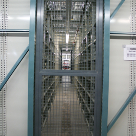 Shelving on Pick Module Level with Security Cage Door