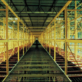 Pallet Flow Rack in Pick Module Center Aisle with Bar Grating