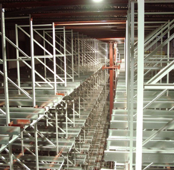 Narrow aisles provide an easy pathway for AS/RS system cranes to navigate as they retrieve product with speed and accuracy.