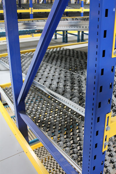 Carton Flow shelves in a Pick Module with guard rails at floor level